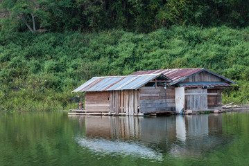 Wooden house on the river at Thailand