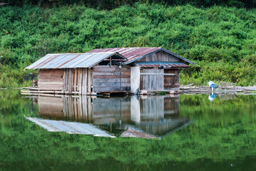 Wooden house on the river at Thailand