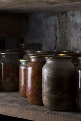 Vegetables preserves on wooden background