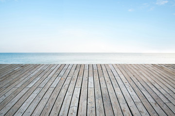 Old vertical striped wooden terrace with sky sea