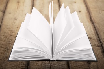 Art. Image of opened magic book with magic lights