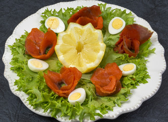 Sockeye salmon on salad leaves