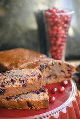 Pieces of sweet chocolate cake with cranberries