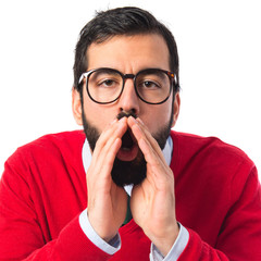 Hipster man shouting over white background