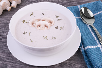 Fresh cream of mushroom soup in a white bowl