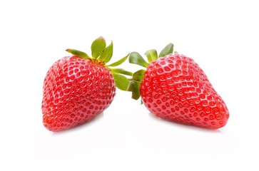 Two strawberries on white background