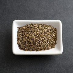 Flax seeds in bowl on the table