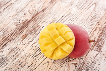 Mango fruit on wood