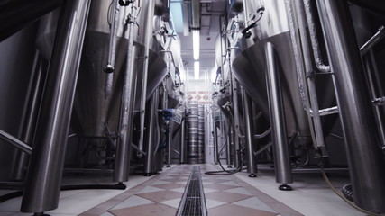 the modern brewery beer steel large tanks in laboratory - Powered by Adobe