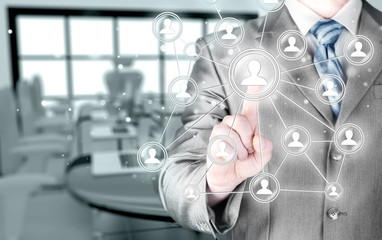 man hand pressing social media icon