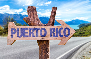 Puerto Rico wooden sign with road background