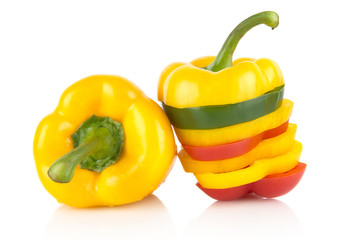 Closeup slices of yellow bell peppers on white