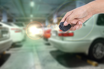 Hand holding remote control car key