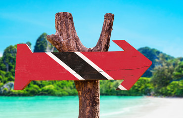 Trinidad and Tobago Flag wooden sign with beach background