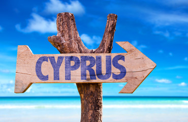 Cyprus wooden sign with beach background
