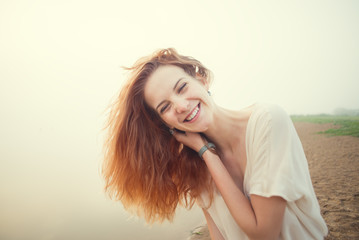 Fototapeta premium happy young girl laughing