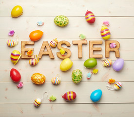 Fototapeta na wymiar Easter wooden letter composition