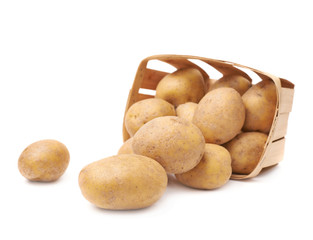 Fototapeta na wymiar Pile of washed potatoes in a wooden basket