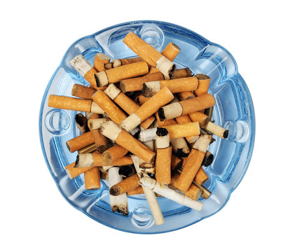 Cigarette butts in the ashtray isolated on white