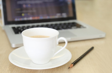Coffee Cup on the Table with Computer  for Business Concept.