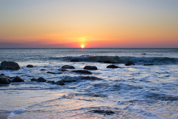 Fototapeta na wymiar Power of sunrise and sea