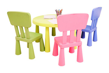 Green table and colorful chairs for little kids