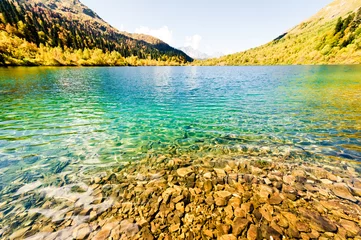 Tuinposter Mountain lake Kardyvach, Caucasus © Olivia
