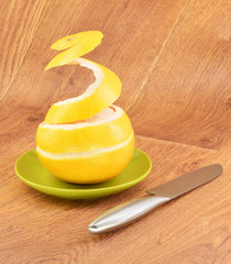 Ripe grapefruit on a wooden background
