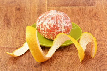 Ripe grapefruit on a wooden background