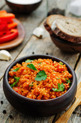 millet porridge with tomato sauce, garlic and parsley