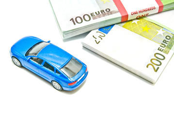 euro notes and blue car