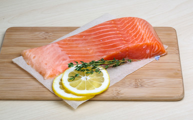 Salted Salmon on the wood background