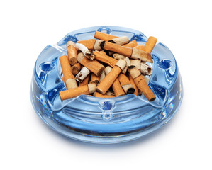 Cigarette butts in the ashtray on white