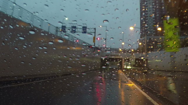 Rain traffic at twilight