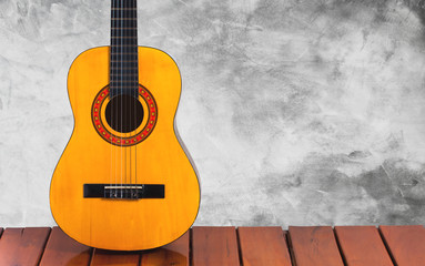 Obraz premium Guitar in blank empty room background