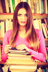 Hipster girl student in college library