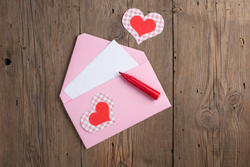 Love letter on old wooden background