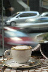 Cup of coffee on a table
