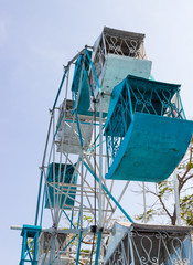 old blue and white ferris wheel