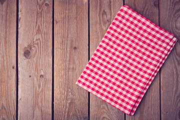 Obraz premium Vintage background with tablecloth on wooden table