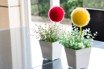 Plastic flowers on the table