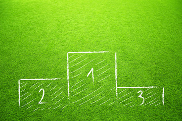 Winners podium sketch on soccer grass