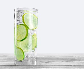 Ice. Summer drinks with ice, fresh berries, lemon and lime