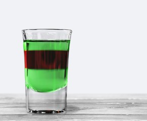 Bar. Several alcoholic shots of different drinks at a party in a