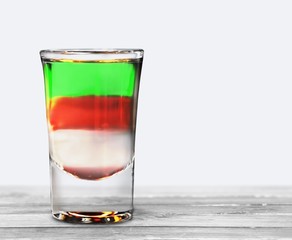 Bar. Several alcoholic shots of different drinks at a party in a