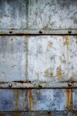 old rusty metal with a worn and scratched paint