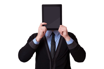 Businessman holding up a tablet pc in front of his face