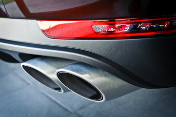 Close up of a car dual exhaust pipe