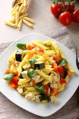 Pasta with swordfish, zucchini and cherry tomatoes