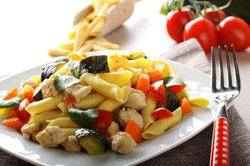Pasta with swordfish, zucchini and cherry tomatoes
